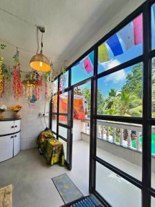 Sundowner Cozy 1 BHK ,5 min Beach ,AC & Balcony