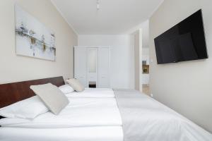 Unique Apartments in Kołobrzeg with Parking, Sauna and Gym by Noclegi Renters