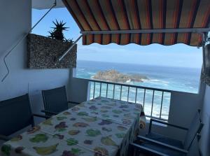 Apartamento acogedor con terraza frente al mar y vistas al Teide