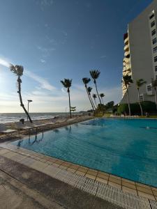 Beachfront Apartments with Sea View Balcony, Pool and Parking
