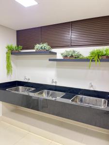 Flat aconchegante - Perto de Tudo - Vista Livre - Estacionamento privativo e Portaria 24h - Wi-Fi 600mbps