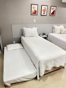 Flat aconchegante - Perto de Tudo - Vista Livre - Estacionamento privativo e Portaria 24h - Wi-Fi 600mbps