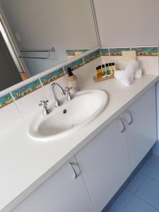 Sandy Toes and Sunsets Beach House