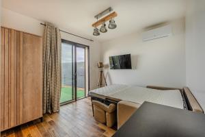 Charmant Studio dans dépendance face à la mer