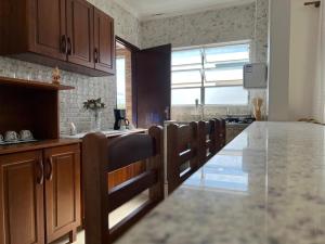 A poucos passos da praia, moderno e confortável