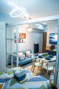 Elivion Staycations at McKinley Hill, near Venice, BGC, with Pool & Wifi