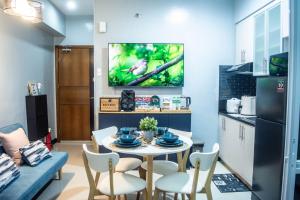 Elivion Staycations at McKinley Hill, near Venice, BGC, with Pool & Wifi