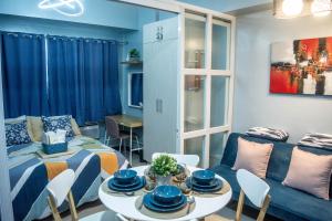 Elivion Staycations at McKinley Hill, near Venice, BGC, with Pool & Wifi