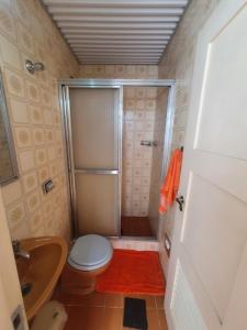 Praia pe na áreia com garagem e suite