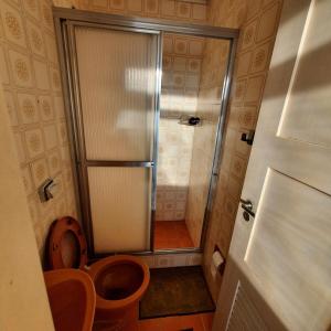 Praia pe na áreia com garagem e suite