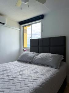 Close to shopping malls and the airport