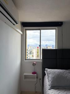 Close to shopping malls and the airport