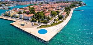 Villa -pool with whirpool and waterfall near sandy beach - by TRAVELER tourist agency Krk ID 2174