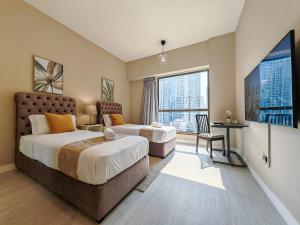 Modern, spacious, Luxe 5BR plus Maid condo in JBR, near JBR Beach, Marina view, By La Buena Vida Holiday Homes