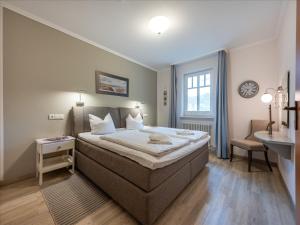 Dünenpark Binz - Komfortplus Ferienwohnung mit 1 Schlafzimmer und Balkon im Obergeschoss 205
