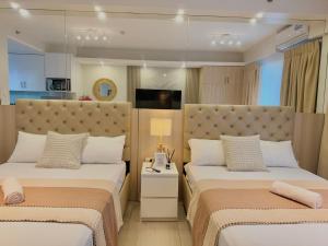 Le Luna Unit - Affordable Staycation near Airport & MOA with pool by Voyage Vista - Azure & Shore Staycation