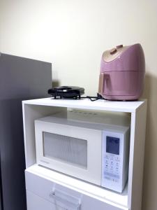 Espaçosa Casa com WI-FI Perto do Aroporto - Conforto e Praticidade GEM19