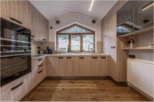 Courchevel 1650 - Charming Penthouse with Stunning Views & Private Parking