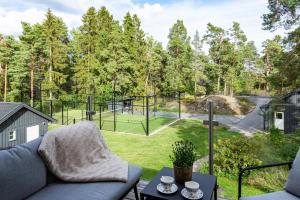 Archipelago Villa With Private Padel court & dock