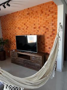 Apartamento com ar-condicionado, Wi-Fi no Campeche e estacionamento gratuito