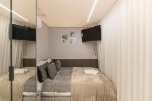 Varanda panorâmica | Suíte Comfort Batel