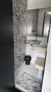 Suíte externa de casa em condomínio fechado