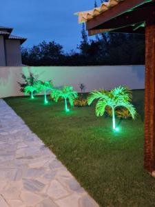 Casa com 4 suítes perto da praia