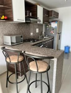 Apartamento con Excelente Vista con Piscina, Jacuzzi, BBQ y Balcón