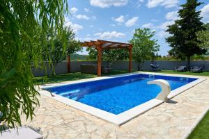 Family-friendly apartments with swimming pool Ljubac, Zadar - 14148