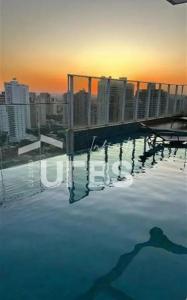 Flat Novo, Lindo e completo!Com piscina Incrível e pôr sol!