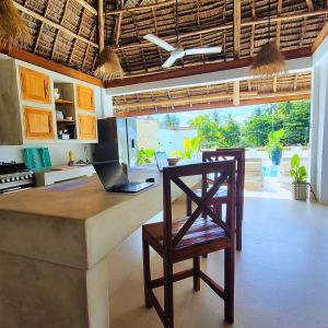 Luxury Penthouse with private rooftop pool prime location Paje Beach Zanzibar TV WIFI AC steps to the beach