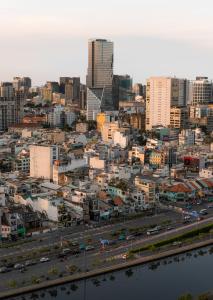 LuxeStay Saigon - Luxury Studios, 1 Bedroom, 2 Bedroom & 3 Bedroom Apartments - City Centre Ho Chi Minh City, Pool Access, Ideal for Families Business Travelers and Group Bookings