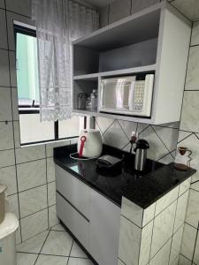 Amplo apartamento à 350 metros do mar