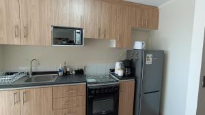 Depto en condo, 1D 1B, aire estacionamiento, full