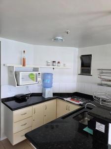 LOFT - Beira Mar, com piscina, Wi-Fi e garagem