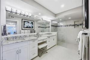 Sophisticated Three-Bedroom Coastal Apartment with Fireplace