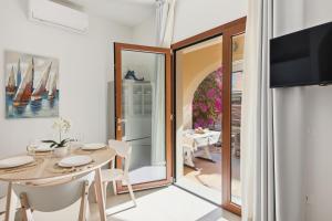 Residence Moresca , Appartamento Tavolara con Giardino e Vista Mare a 80 mt dalla Spiaggia