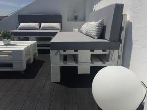 A Terrace on a Topfloor with a View