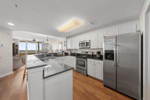 Beach Club 208C by Youngs Suncoast