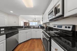 Beach Club 208C by Youngs Suncoast