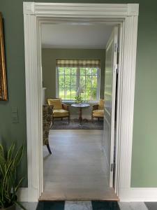 Manor House Overlooking Fields And Garden