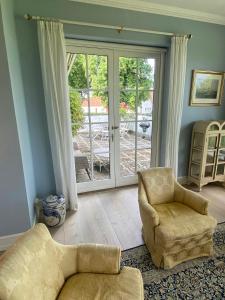 Manor House Overlooking Fields And Garden