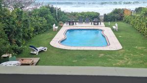 Casa Pé na Areia com piscina a beira mar