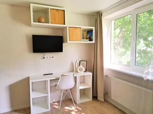Vilnius cozy apartment By the river With balcony 20min Old Town Free parking Self check in