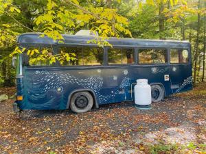 Magic Bus on river whot tub at Smugglers Notch