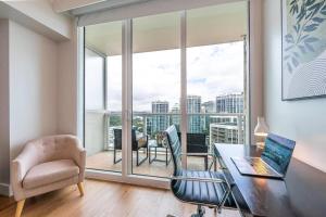 Elevated Grove Escape with Balcony & Bay Views-Includes Parking