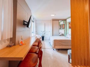 Flat ate 3 pessoas ao lado Shoppings