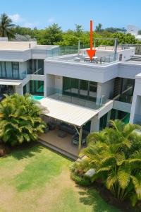 Villa Serenity Seafront with Tropical Gardens by Serenity