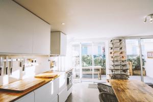 Koala Surf House, en bord dOcéan, planches de surf et skates à disposition