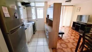 11-3 Depto amoblado y equipado a pasos de la playa Arica!!